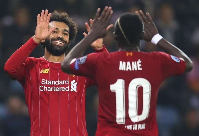 Mohamed Salah y Sadio Mané celebran el triunfo del Liverpool | UEFA.COM