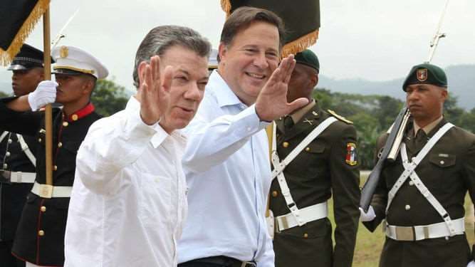 Juan Carlos Varela  y Manuel Santos